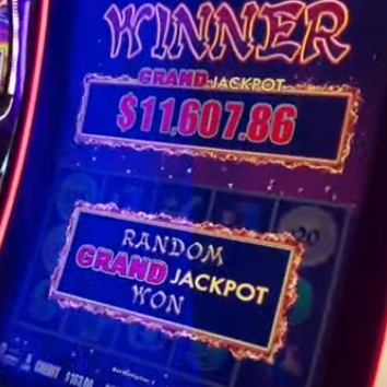 Player wins the random grand jackpot on a dragon link slot machine manufactured by Aristocrat
